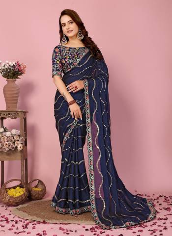 Garb These Party Wear Saree in Fine Colored.These Saree Are Rangoli Silk And Blouse is Art Silk Fabricated.Its Beautified With Designer Multy Thread,Sequance Embroidery Work.