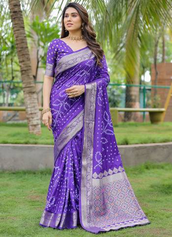 Looking These Party Wear Saree in Fine Colored.These Saree And Blouse is Fabricated On Dola Silk.Its Beautified With Wevon Designer With Handmade Bandhej Printed.