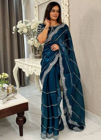 Attrective These Party Wear Saree in Fine Colored.These Saree Are Jimmy Choo And Blouse is Jimmy Choo Fabricated.Its Beautified With Designer Silver Jari,Sequance Embroidery Work.