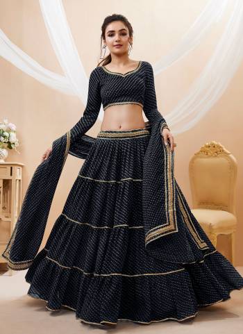 For A Designer Look,Grab These Lehenga Choli in Fine Colored.These Lehenga Are Georgette And Blouse Are Fabricated On Georgette Pair With Dupatta Are Georgette.Its Beautified With Designer Laheriya Printed With Lace.