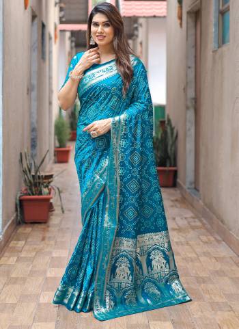 Garb These Festive Wear Saree in Fine Colored.These Saree And Blouse is Fabricated On Dola Silk.Its Beautified With Kanchi Wevon Jari Designer With Bandhej Printed.