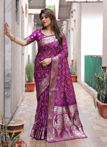 Garb These Festive Wear Saree in Fine Colored.These Saree And Blouse is Fabricated On Dola Silk.Its Beautified With Kanchi Wevon Jari Designer With Bandhej Printed.