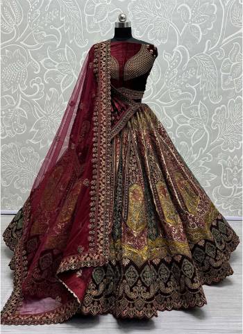 For A Fancy Designer Look,Grab These Lehenga Choli With 2 Dupatta in Fine Colored.These Lehenga And Choli Are Velvet And Dupatta Are Fabricated On Soft Net & Velvet Pair.Its Beautified With Designer Velvet & Silk Patch,Dori, Muty Thread,Sequance Embroidery With Diamond Work.