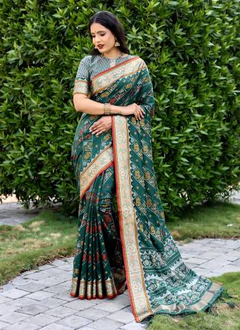 Garb These Festive Wear Saree in Fine Colored.These Saree And Blouse is Fabricated On Handloom Silk.Its Beautified With Wevon Ikkat Patola Designer.