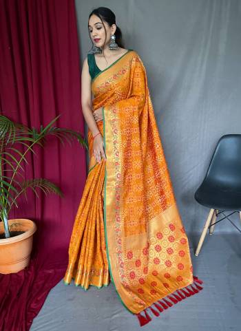 Attrective This Partywear Saree Paired With Blouse.This Saree And Blouse Are Patola Silk Based Fabric With Weaving Jacquard Jari Designer. Buy This Pretty Saree Now.