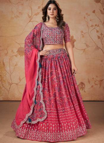 For A Designer Look,Grab These Lehenga Choli in Fine Colored.These Lehenga And Blouse Are Fabricated On Faux Georgette Pair With Faux Georgette Dupatta.Its Beautified With Digital Printed,Jari, Sequance Embroidery Work.