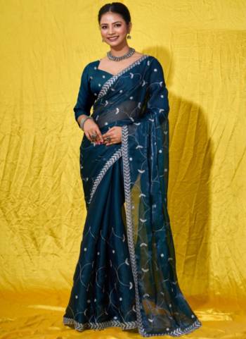 Looking These Party Wear Saree in Fine Colored.These Saree Are Burberry Silk And Blouse is Fabricated On Burberry Silk.Its Beautified With Designer Silver Jari,Sequance Embroidery Work.