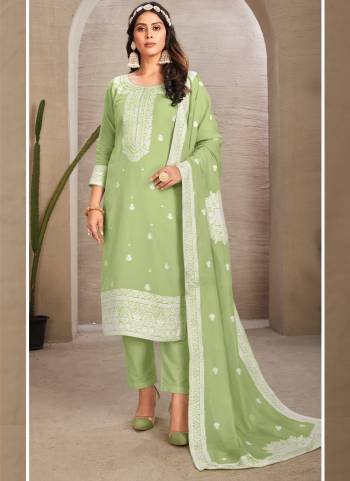 Garb These Suit in Fine Colored Pair With Bottom And Dupatta.These Top And Dupatta Are Fabricated On Organza Pair With Jam Satin Bottom.Its Beautified With Wevon Designer With Hand Work.