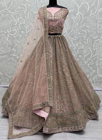 For A Fancy Designer Look,Grab These Lehenga Choli With Dupatta in Fine Colored.These Lehenga And Choli Are Net And Dupatta Are Fabricated On Soft Net Pair.Its Beautified With Designer Rose Pattern,Sequance,Mirror,Various Jari Embroidery Work.