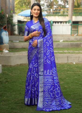 Garb These Festive Wear Saree in Fine Colored.These Saree And Blouse is Fabricated On Handloom Silk.Its Beautified With Wevon Border Designer With Handmade Bandhej Printed.