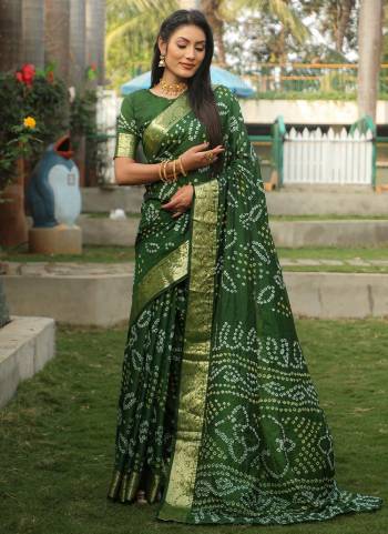 Garb These Festive Wear Saree in Fine Colored.These Saree And Blouse is Fabricated On Handloom Silk.Its Beautified With Wevon Border Designer With Handmade Bandhej Printed.