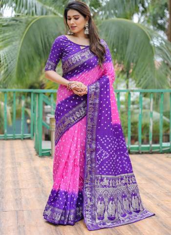 Garb These Festive Wear Saree in Fine Colored.These Saree And Blouse is Fabricated On Dola Silk.Its Beautified With Wevon Border Pallu Designer With Bandhj Handmade Printed.