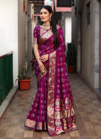 Looking These Party Wear Saree in Fine Colored.These Saree And Blouse is Fabricated On Dola Silk.Its Beautified With Wevon Matha Border Pallu Designer With Hand Made Bandhej Printed.