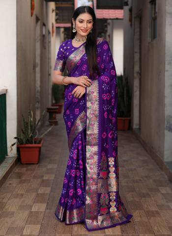 Looking These Party Wear Saree in Fine Colored.These Saree And Blouse is Fabricated On Dola Silk.Its Beautified With Wevon Matha Border Pallu Designer With Hand Made Bandhej Printed.