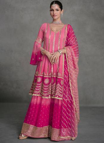 Garb These Designer Sharara Suits in Fine Colored Pair With Dupatta.These Top Are Georgette And Dupatta Are Fabricated On Net Pair With Santoon Bottom.Its Beautified With Heavy Designer Embroidery Work