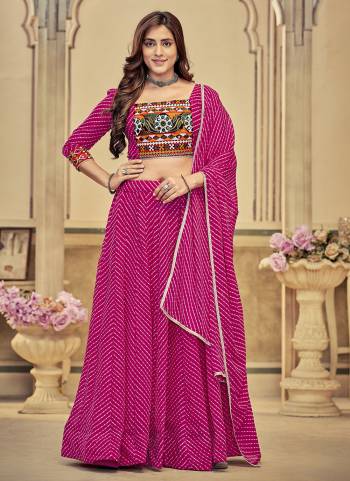 Grab These Navratri Special Lehenga Choli in Fine Colored.These Lehenga Are Georgette Choli Are Georgette And Dupatta Are Fabricated On Georgette Pair.Its Beautified With Designer Thread,Mirror Embroidery Work.