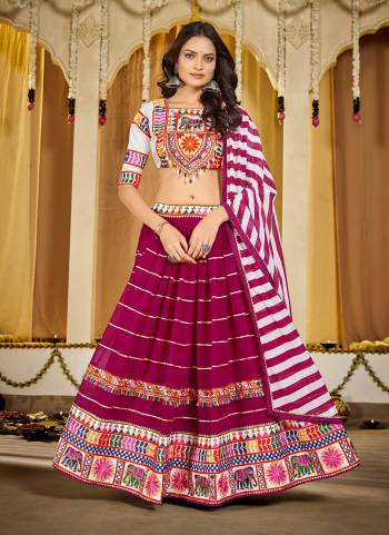 Looking These Navratri Special Lehenga Choli in Fine Colored.These Lehenga Are Georgette Choli Are Mono Silk And Dupatta Are Fabricated On Georgette Pair.Its Beautified With Designer Thread,Mirror Embroidery Work.