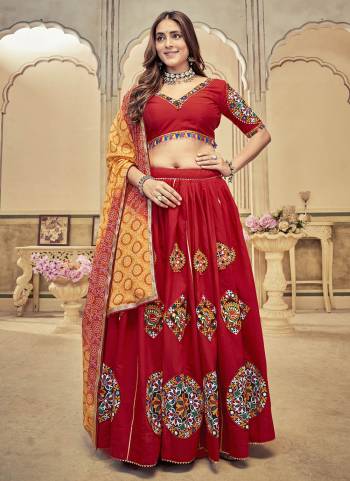 Looking These Navratri Special Lehenga Choli in Fine Colored.These Lehenga Are Cotton Silk Choli Are Cotton Silk And Dupatta Are Fabricated On Chiffon Pair.Its Beautified With Designer Thread,Mirror Embroidery Work.