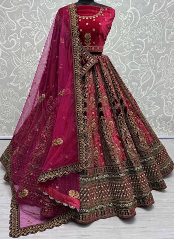 For A Fancy Designer Look,Grab These Lehenga Choli With 2 Dupatta in Fine Colored.These Lehenga And Choli Are Velvet And Dupatta Are Fabricated On Soft Net & Velvet Pair.Its Beautified With Designer Velvet Patch Kali,Dori,Sequance,Multy Thread Embroidery With Diamond Work.