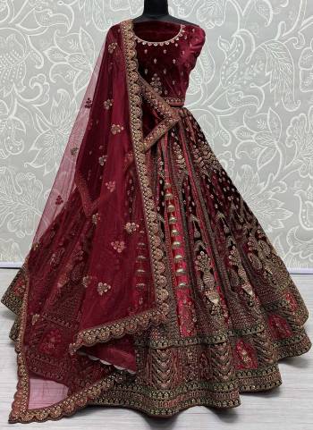 For A Fancy Designer Look,Grab These Lehenga Choli With 2 Dupatta in Fine Colored.These Lehenga And Choli Are Velvet And Dupatta Are Fabricated On Soft Net & Velvet Pair.Its Beautified With Designer Velvet Kali Patch,Dori, Jari Embroidery With Diamond Work.