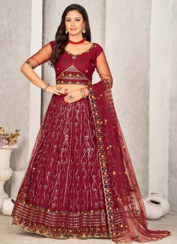 Garb These Partywear Lehenga Choli in Fine Colored.These Lehenga Are Net Choli Are Net And Dupatta Are Fabricated On Net Pair.Its Beautified With Designer Embroidery Work.