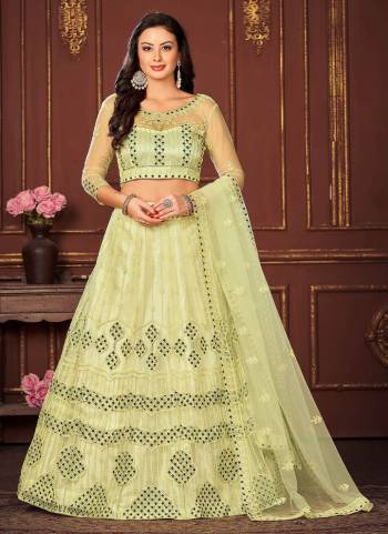 Garb These Partywear Lehenga Choli in Fine Colored.These Lehenga Are Net Choli Are Net And Dupatta Are Fabricated On Net Pair.Its Beautified With Designer Embroidery Work.