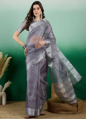 Garb These Party Wear Saree in Fine Colored.These Saree And Blouse Is Khadi Organza Fabricated.Its Beautified With Wevon Jacquard Designer.