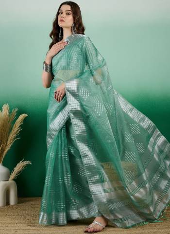 Garb These Party Wear Saree in Fine Colored.These Saree And Blouse Is Khadi Organza Fabricated.Its Beautified With Wevon Jacquard Designer.