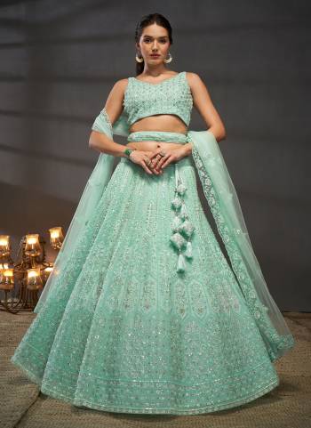 Attrective Looking This Partywear Fine Color Heavy Designer Choli Fabric Shantoon And Lahenga Net And Dupatta Net In Fabricated Beautified With Attrective Designer Thread,Sequance Embroidery Work. Buy Now.