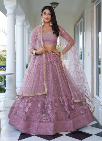 For A Different Look,Grab These Party Wear Designer Lehenga in All Over Pretty Colored Pair With Blouse And Dupatta.These Lehenga Choli And Dupatta is All Over Butterfly Net Base Fabric With Designer Cotton Thread,Sequance Embroidery Work.