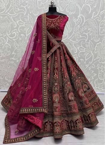 For A Fancy Designer Look,Grab These Lehenga Choli With 2 Dupatta in Fine Colored.These Lehenga And Choli Are Velvet And Dupatta Are Fabricated On Soft Net & Velvet Pair.Its Beautified With Designer Patch Work,Sequance,Thread,Dori,Jari Embroidery With Diamond Work.