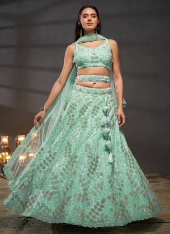 Attrective Looking This Partywear Fine Color Heavy Designer Choli Fabric Shantoon And Lahenga Net And Dupatta Net In Fabricated Beautified With Attrective Designer Thread,Sequance Embroidery Work. Buy Now.