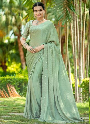 Looking These Party Wear Saree in Fine Colored.These Saree And Blouse is Fabricated On Satin Chiffon.Its Beautified With Heavy Designer Broad Hand Work With Stone Work.