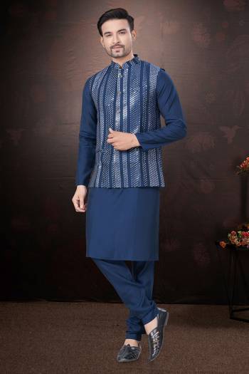 Looking These Party Wear Mans Wear Kutra Payjama With Koti wearing this fashionable. Tailored Kurta Pajama With Koti finest Silk Fabriced With Mirror,Thread Embroidery Work and fashioned with a banded collar for a dash of style.