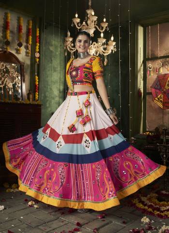 Attrective These Navratri Special Lehenga Choli in Fine Colored.These Lehenga Are Muslin Cotton And Blouse Are Rayon And Dupatta Are Fabricated On Rayon.Its Beautified With Designer Printed With Mirror,Thread Embroidery Work.