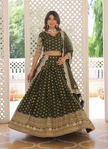 For A Designer Look,Grab These Lehenga Choli in Fine Colored.These Lehenga And Blouse Are Fabricated On Viscose Jacquard Pair With Faux Tabby Dupatta.Its Beautified With Wevon Jacquard Designer With Embroidery Work.