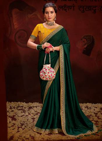 Garb These Party Wear Saree in Fine Colored.These Saree Are Vichitra Silk And Blouse is Fabricated On Raw Silk.Its Beautified With Designer Embroidery Work Blouse And Lace Border With Swarovski Work.