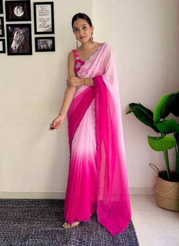 Grab This Beautiful Padding Colour Saree With Fancy Arco Border Work And Heavy Embroidery Sequins Work Blouse Fabricated On Faux Georgette Fabric For Elegant Party Looks. Have This Bollywood Style Saree For Glamorous Feels