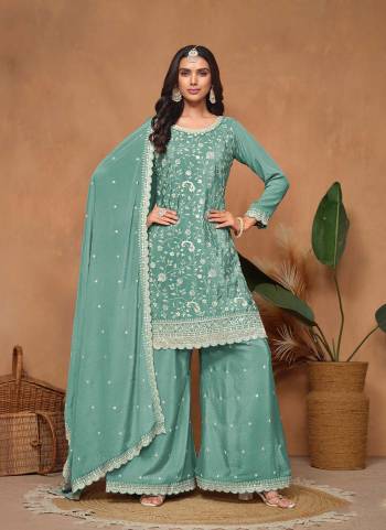 Garb These Party Wear Anarkali Suit in Fine Colored Pair With Bottom And Dupatta. This Suit is fabricated on Chinon Fabric. Its Beautified With Designer Heavy Embroidery And Sequins Work. This Suit Comes with Stitched Palazzo Pant.