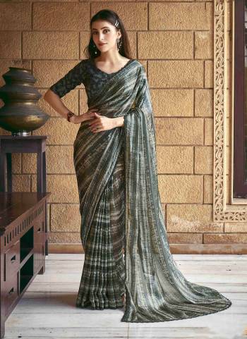 Beautifully Crafted Smart Handwork with print Saree For The Real Fashion Seekers. This Saree Is Fabricated On Satin Silk Fabric With Festive Green Color For Glamorous Looks.