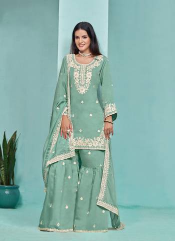 Garb These Party Wear Sharara Suit in Fine Colored Pair With Bottom And Dupatta.These Top And Bottom Are Fabricated On Roman Silk Pair With Organza Dupatta.Its Beautified With Santoon Inner.Its Beautified With Designer Heavy Embroidery Work.