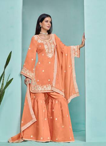 Garb These Party Wear Sharara Suit in Fine Colored Pair With Bottom And Dupatta.These Top And Bottom Are Fabricated On Roman Silk Pair With Organza Dupatta.Its Beautified With Santoon Inner.Its Beautified With Designer Heavy Embroidery Work.