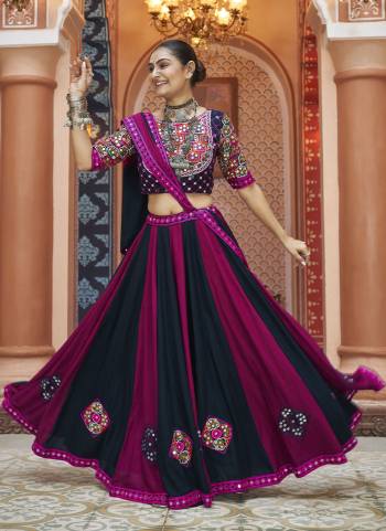 Attrective These Navratri Special Lehenga Choli in Fine Colored.These Lehenga Are Viscose Rayon And Blouse Are Viscose Rayon And Dupatta Are Fabricated On Viscose Rayon.Its Beautified With Designer Mirror,Thread Embroidery Work.