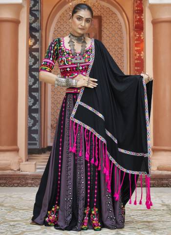 Attrective These Navratri Special Lehenga Choli in Fine Colored.These Lehenga Are Viscose Rayon And Blouse Are Viscose Rayon And Dupatta Are Fabricated On Viscose Rayon.Its Beautified With Designer Mirror,Thread Embroidery Work.