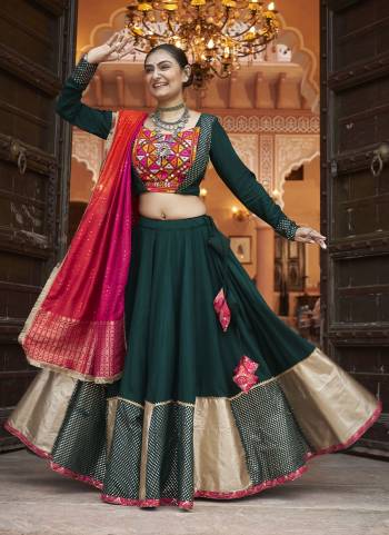 Attrective These Navratri Special Lehenga Choli in Fine Colored.These Lehenga Are Viscose Rayon And Blouse Are Viscose Rayon And Dupatta Are Fabricated On Viscose Rayon.Its Beautified With Designer Mirror,Thread Embroidery Work.