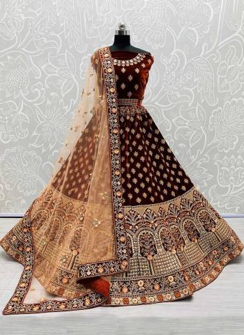 For A Fancy Designer Look,Grab These Lehenga Choli With Dupatta in Fine Colored.These Lehenga And Choli Are Velvet And Dupatta Are Fabricated On Soft Net Pair.Its Beautified With Designer Embroidery With Diamond Work.