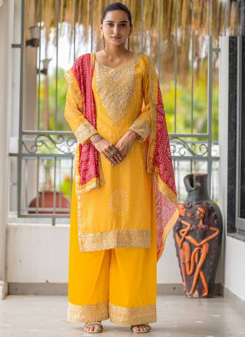 Looking These Designer Plazzo Suits in Fine Colored Pair With Dupatta.These Top And Dupatta Are Fabricated On Chinon Pair With Chinon Bottom.Its Beautified With Bandhani Printed,Designer Embroidery Work