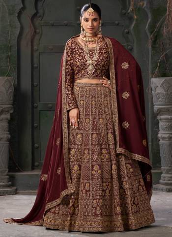 For A Designer Look,Grab These Lehenga Choli in Fine Colored.These Lehenga And Blouse Are Fabricated On Georgette Pair With Georgette Dupatta.Its Beautified With Designer Codding Embroidery With Zarkan Work.