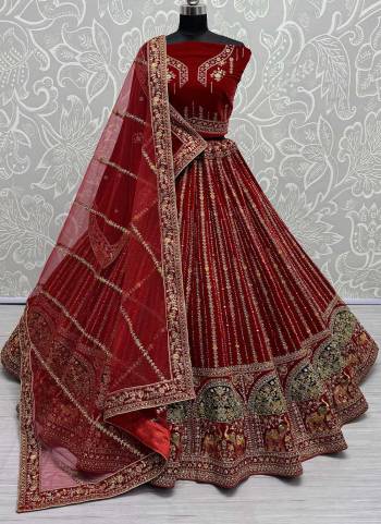 For A Fancy Designer Look,Grab These Lehenga Choli With 2 Dupatta in Fine Colored.These Lehenga And Choli Are Velvet And Dupatta Are Fabricated On Soft Net & Velvet Pair.Its Beautified With Designer Hand Mirror,Thread,Dori,Jari Embroidery With Diamond Work.