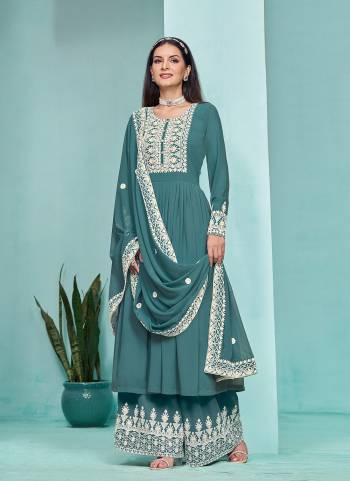 Garb These Party Wear Plazzo Suit in Fine Colored Pair With Bottom And Dupatta.These Top And Bottom Are Fabricated On Faux Georgette Pair With Faux Georgette Dupatta.Its Beautified With Santoon Inner.Its Beautified With Designer Heavy Embroidery Work.